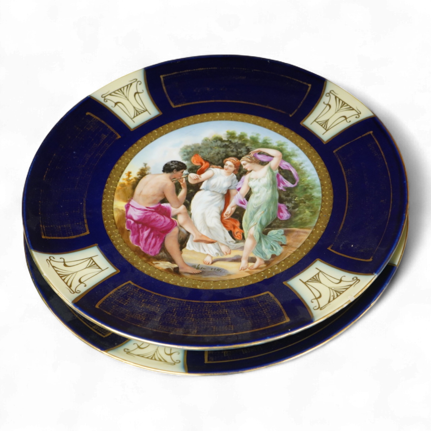 A pair of Vienna style porcelain chargers, early 20th century, 33cm